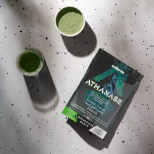 ATHANASE Men's Super Greens Powder package with green drinks