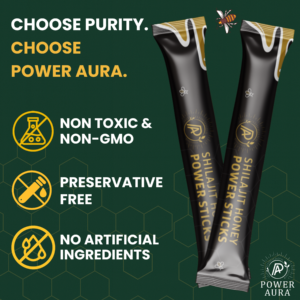 Two Shilajit Honey Power Sticks on a green background