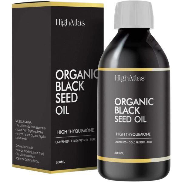 Bottle of organic black seed oil with packaging