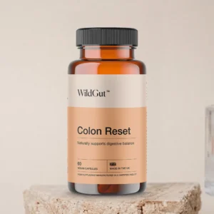 Colon Reset bottle on a stone surface