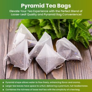 Pyramid herbal tea bags on a wooden table