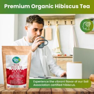 Man drinking a cup of organic hibiscus tea
